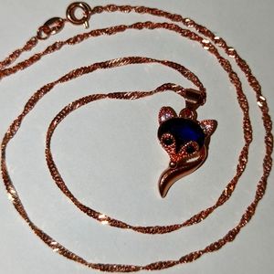 Rose gold fox necklace with blue gemstone